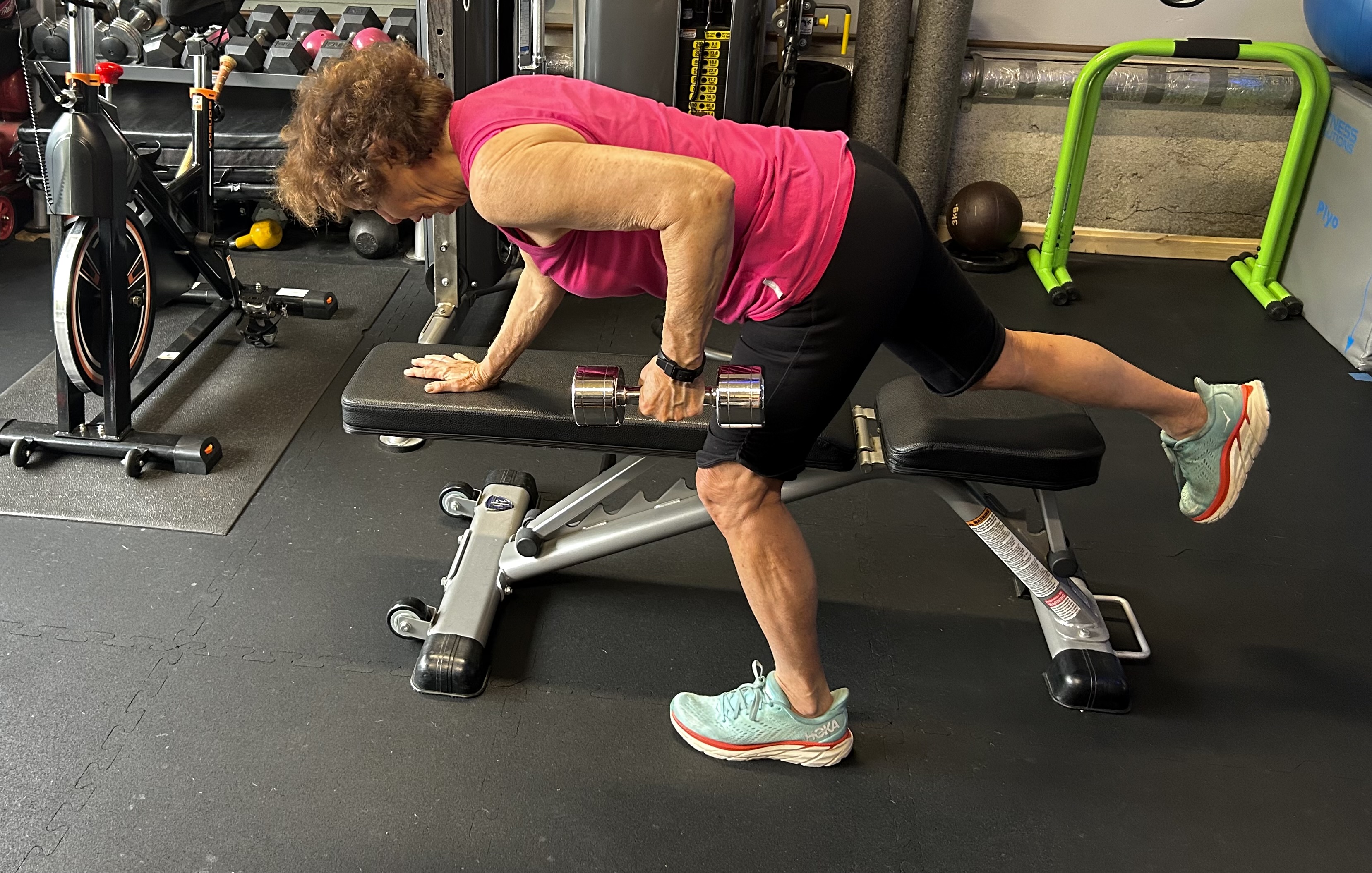 Adult client dumbbell training